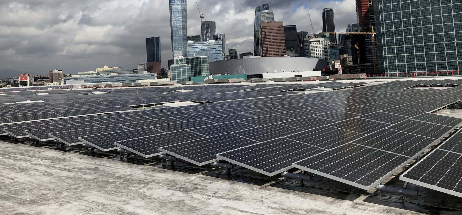 LA Convention Center rooftop solar with downtown Los Angeles skyline